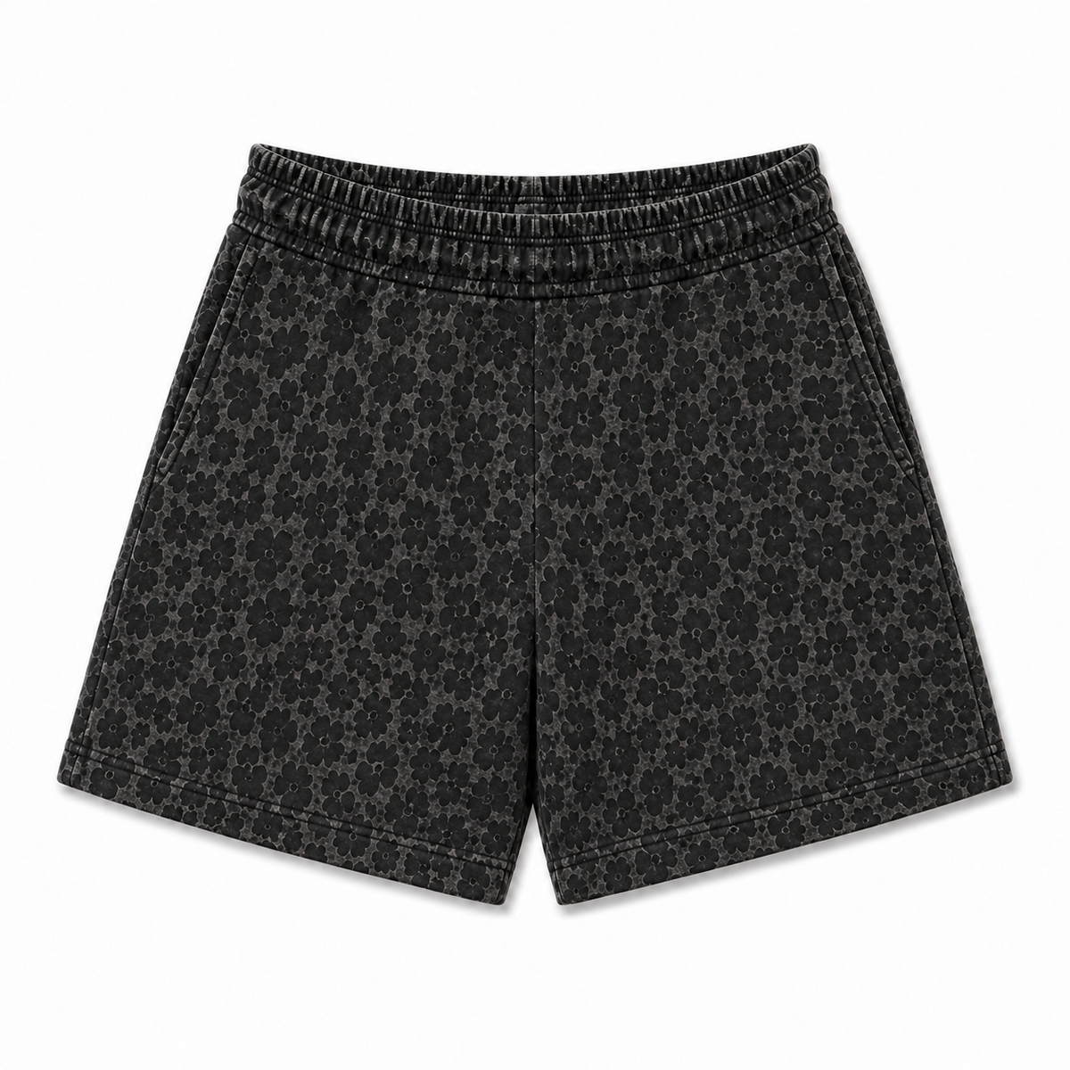 Black and gray patterned shorts with an elastic drawstring waistband, shown flat on a white background.