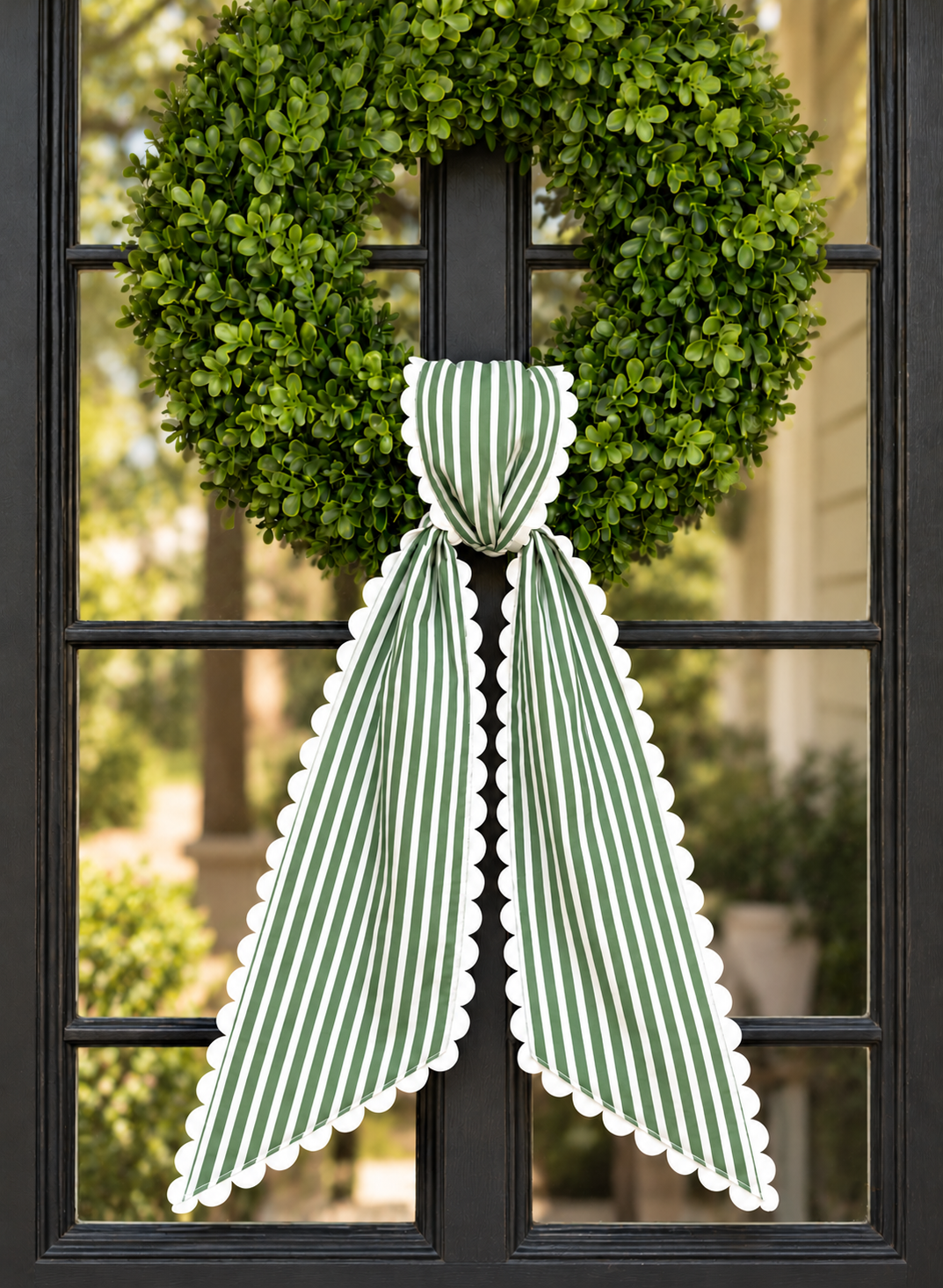 Green stripe wreath sash with white scalloped ric rac trim, Christmas embroidery blank on a boxwood wreath