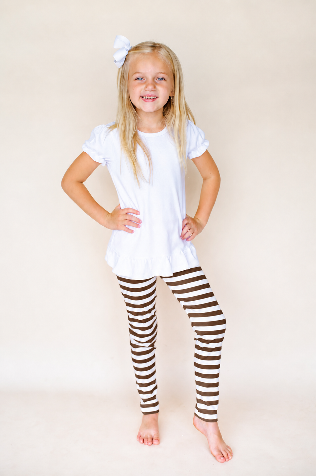 Brown and white striped leggings on girl -- ARB Blanks unisex stripe leggings, 9 sizes, cotton blend